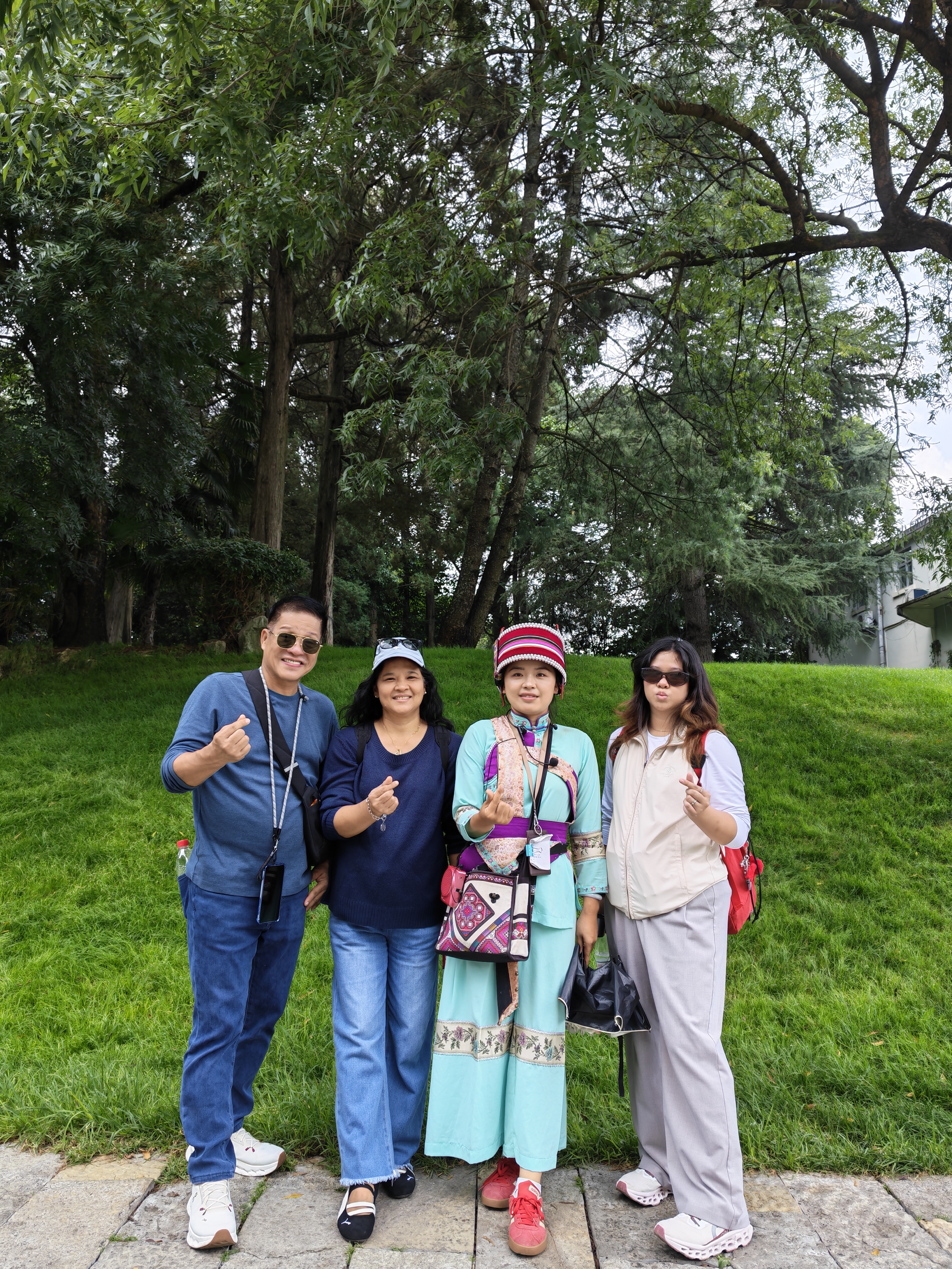 Guests together with a local ethnic guide in Yunnan