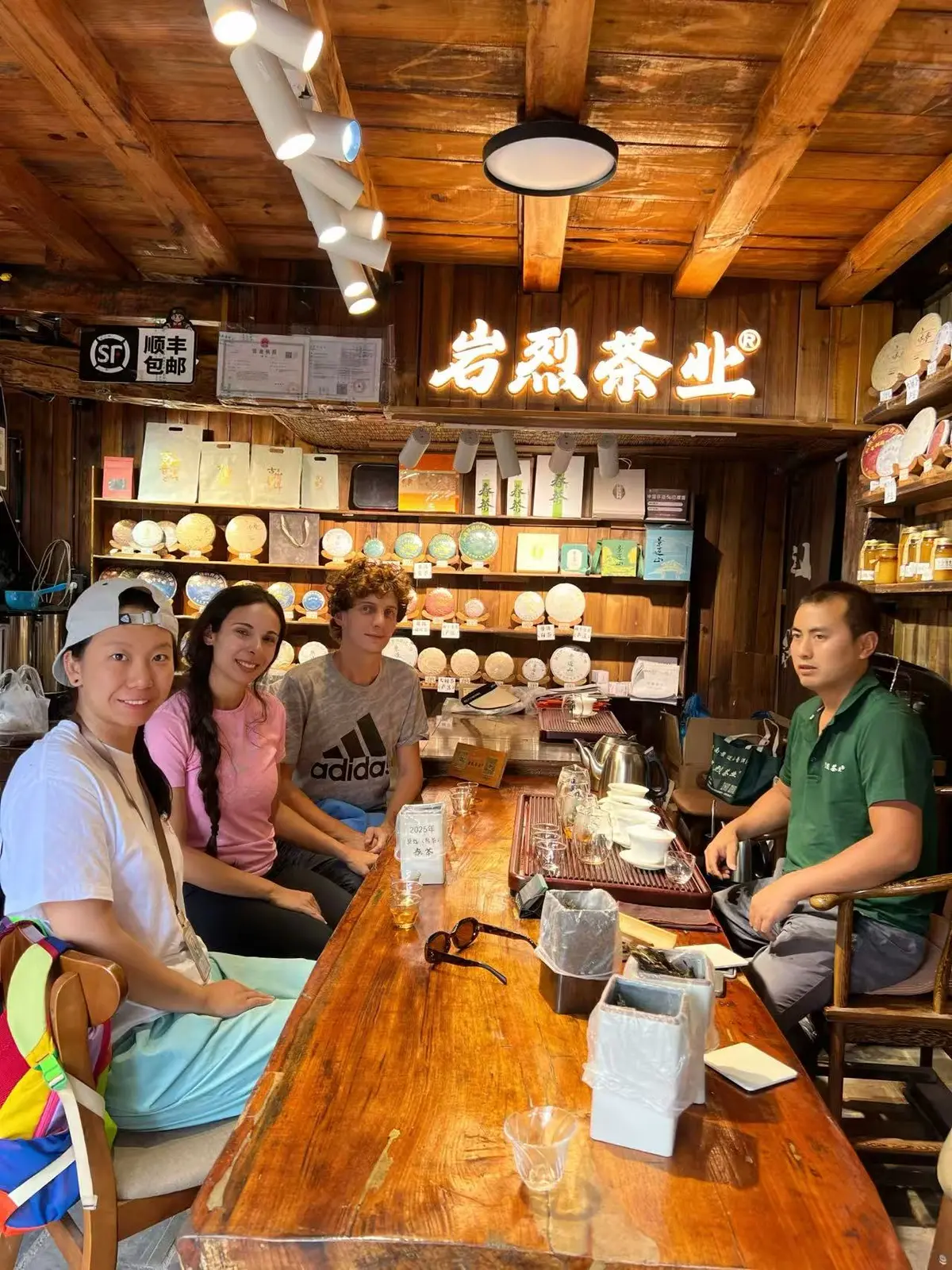 Guests sharing a Yunnan tea experience with Vicky
